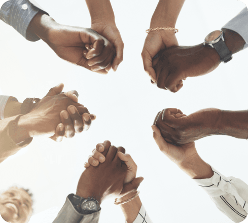 several hands joined together in agreement